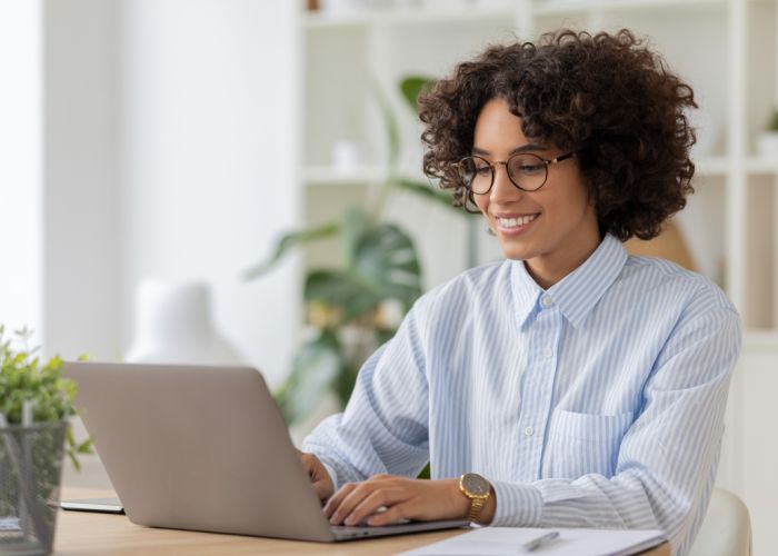Young professional taking a personality test online to explore career options.