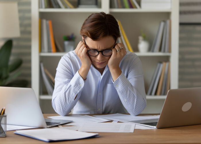 Frustrated business owner struggles to merge two QuickBooks accounts.